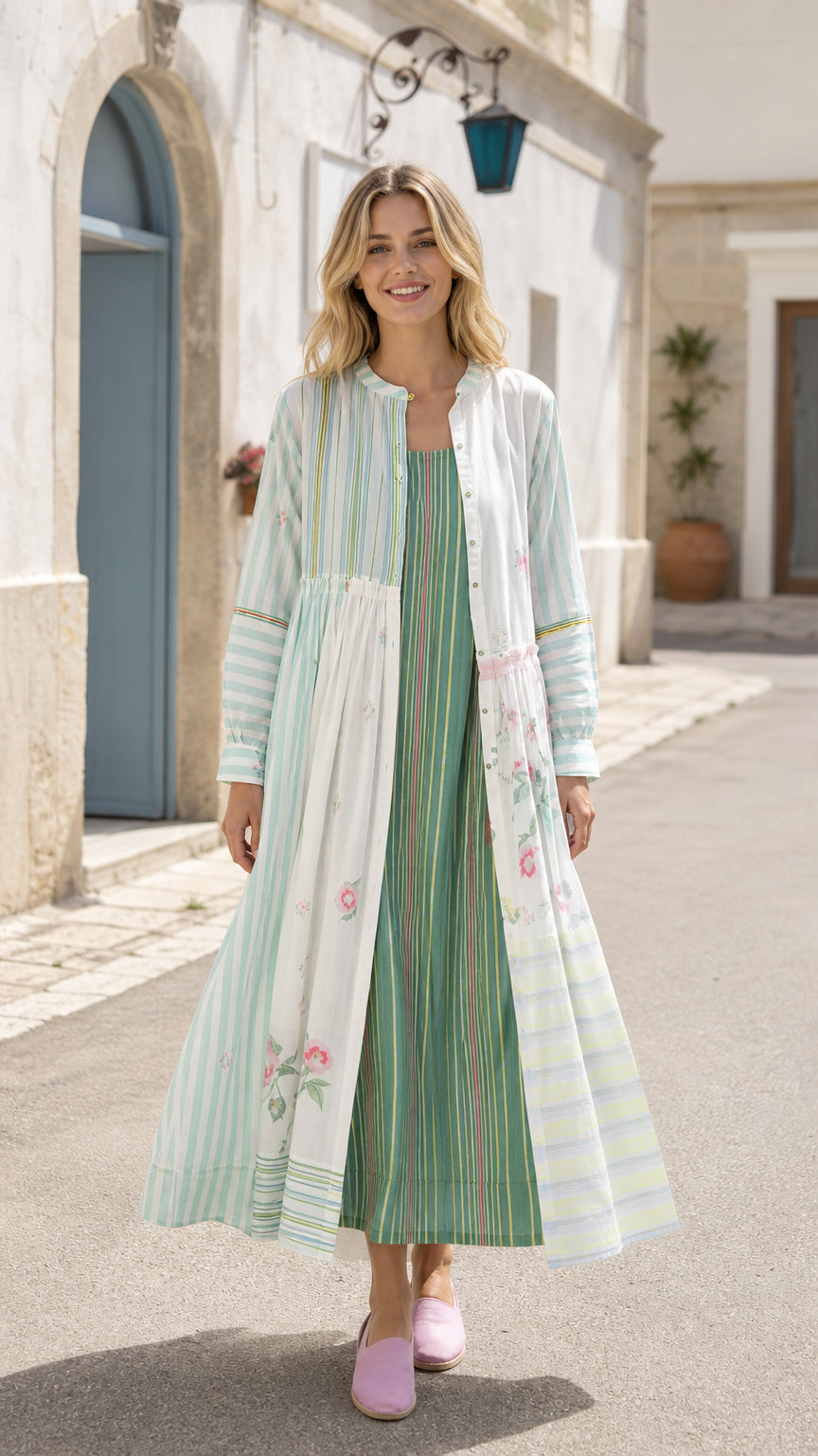 Front view of woman wearing sage green striped maxi cardigan dress set