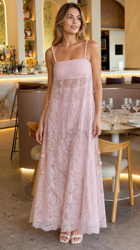 Front view of pink lace maxi dress on model