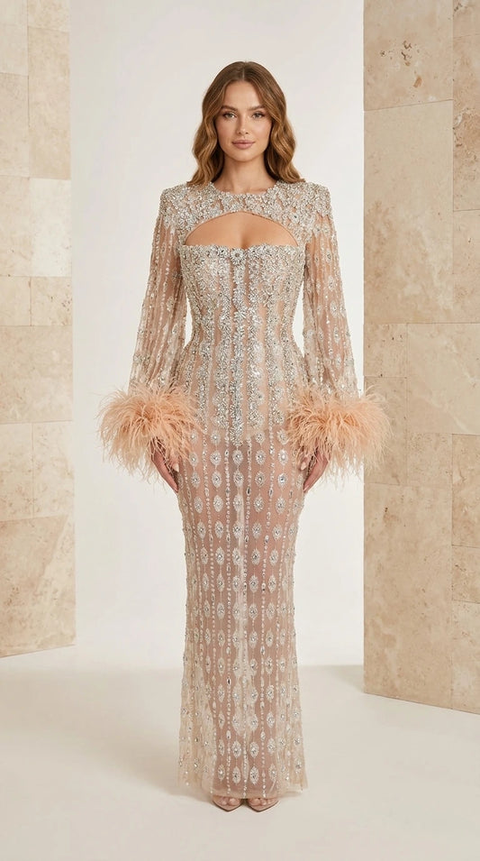 Champagne long sleeve beaded evening maxi gown with feather cuffs and cutout front view