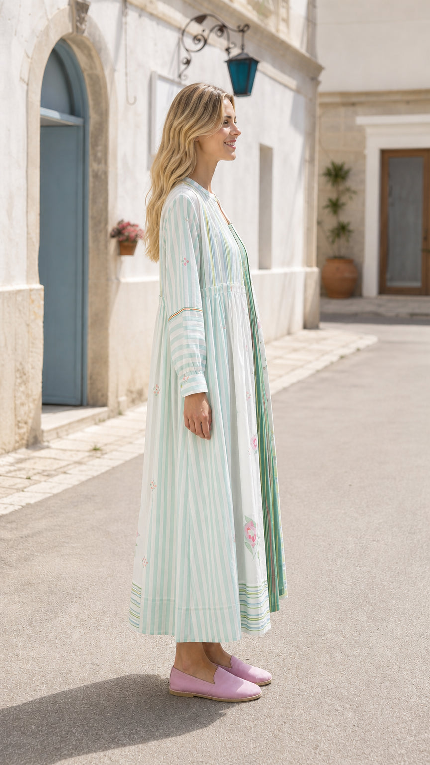 Side profile view of woman in sage green maxi set