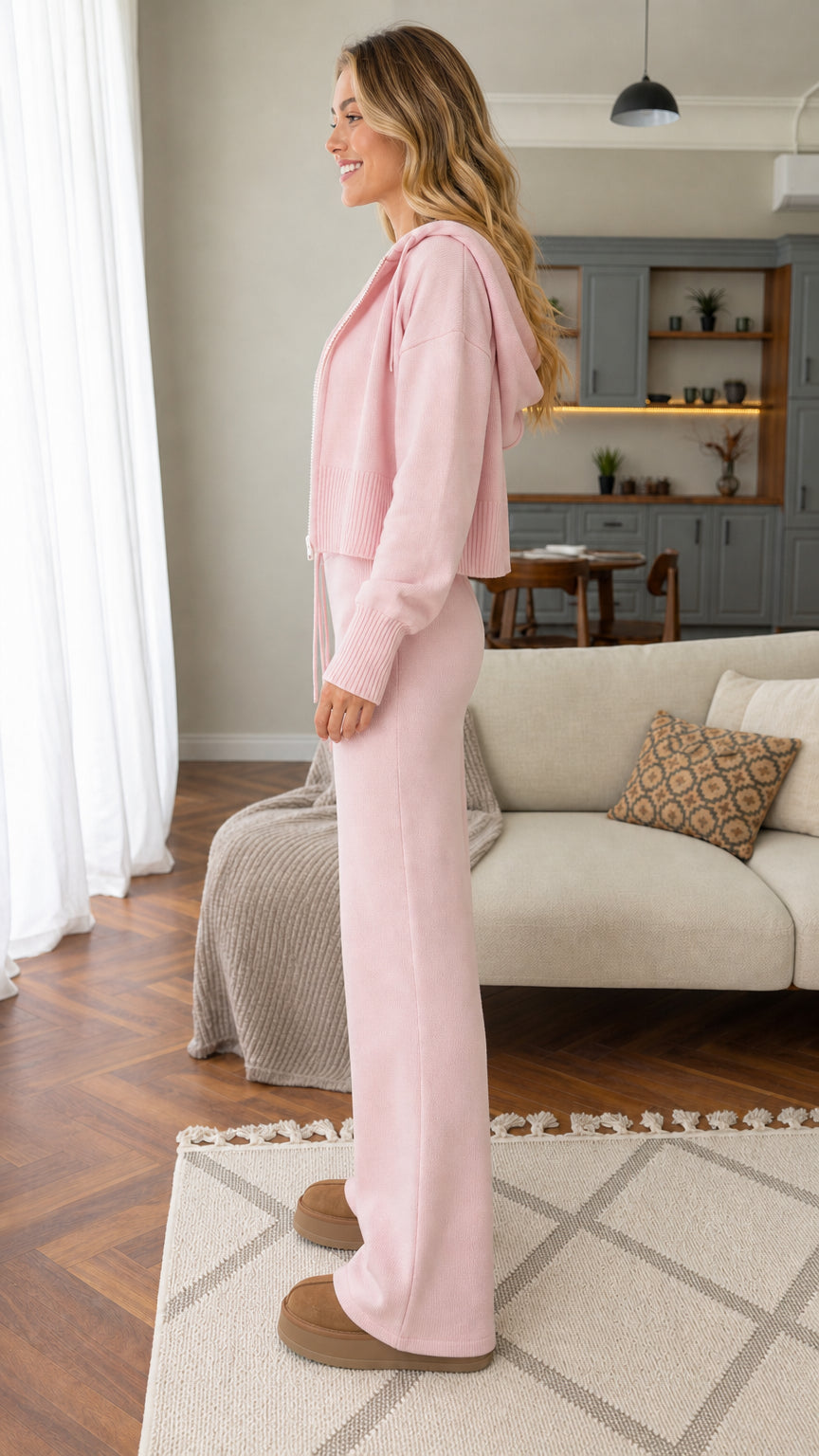 Side view of woman in pink knit lounge set