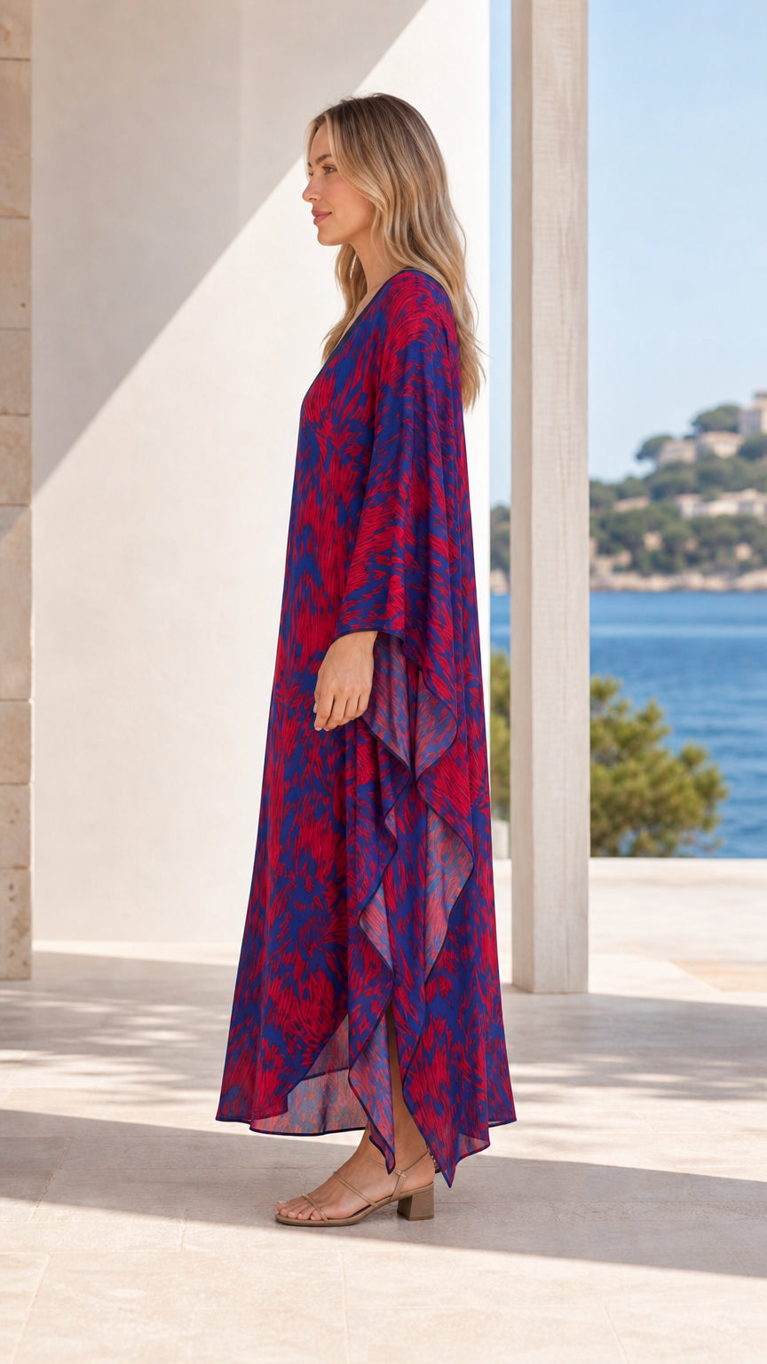 Side view of model wearing blue printed maxi kaftan dress