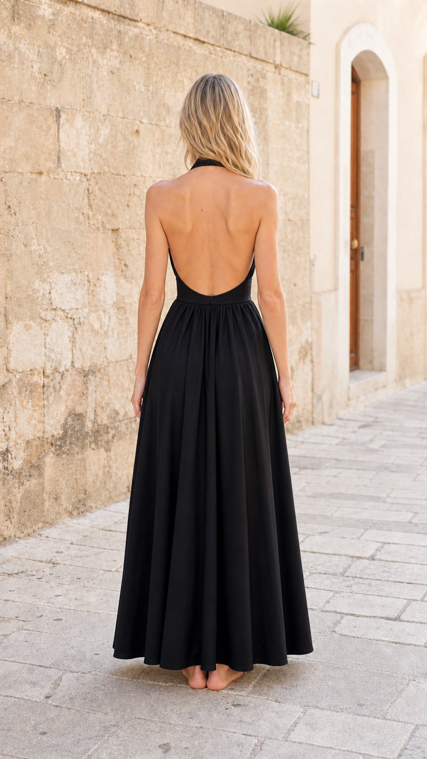 Womens black halter maxi dress back view showing open back
