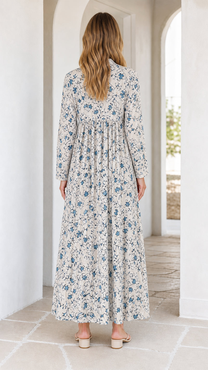 Back view of off-white floral maxi dress
