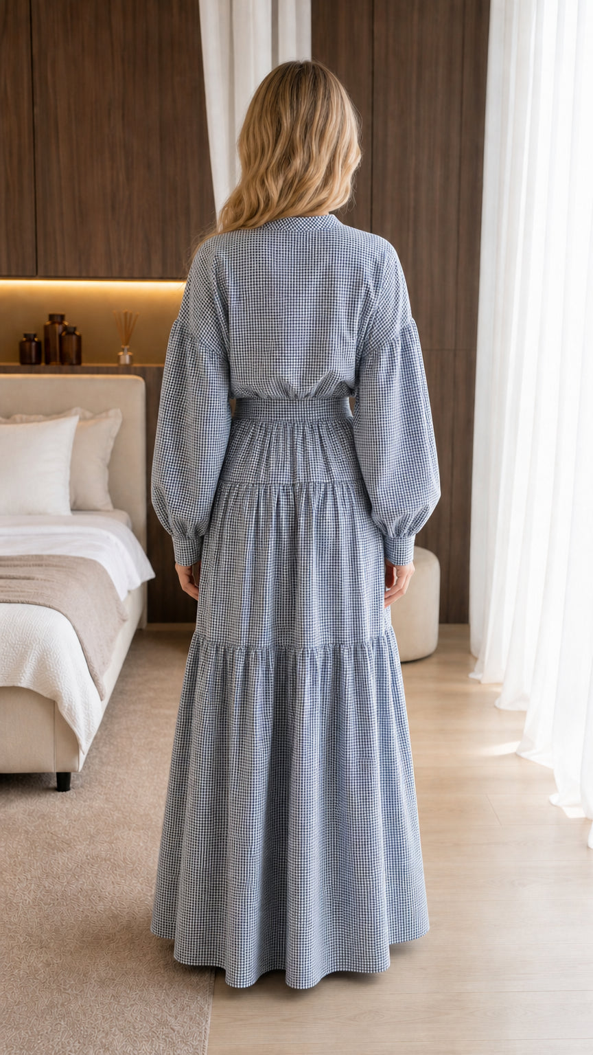 Back view of model wearing blue gingham maxi dress