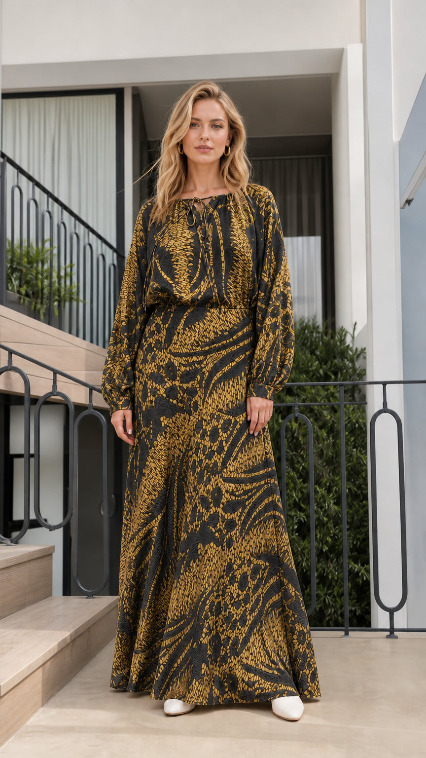 Model wearing black printed long-sleeve maxi dress