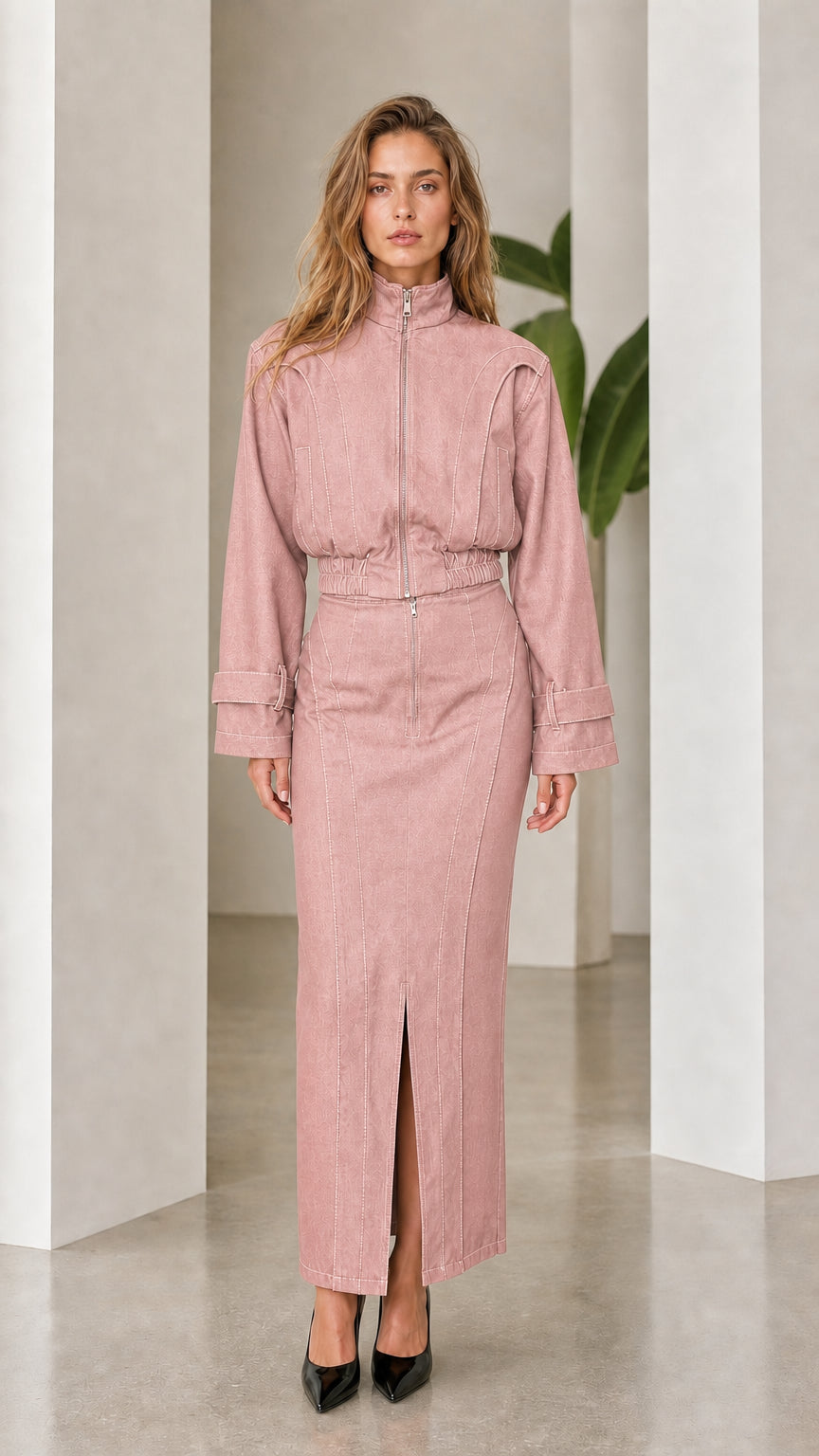 Front view of woman wearing pink denim two-piece set