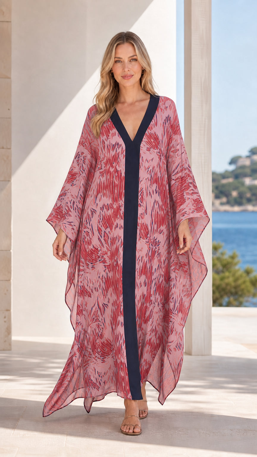 Front view of model wearing pink printed maxi kaftan dress