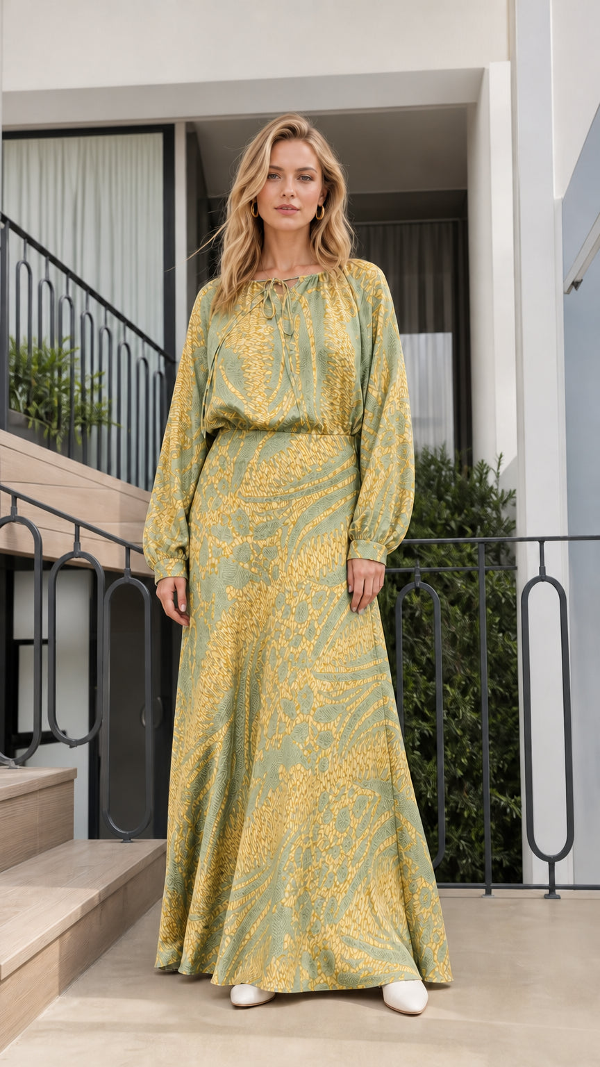 Model wearing green printed long-sleeve maxi dress