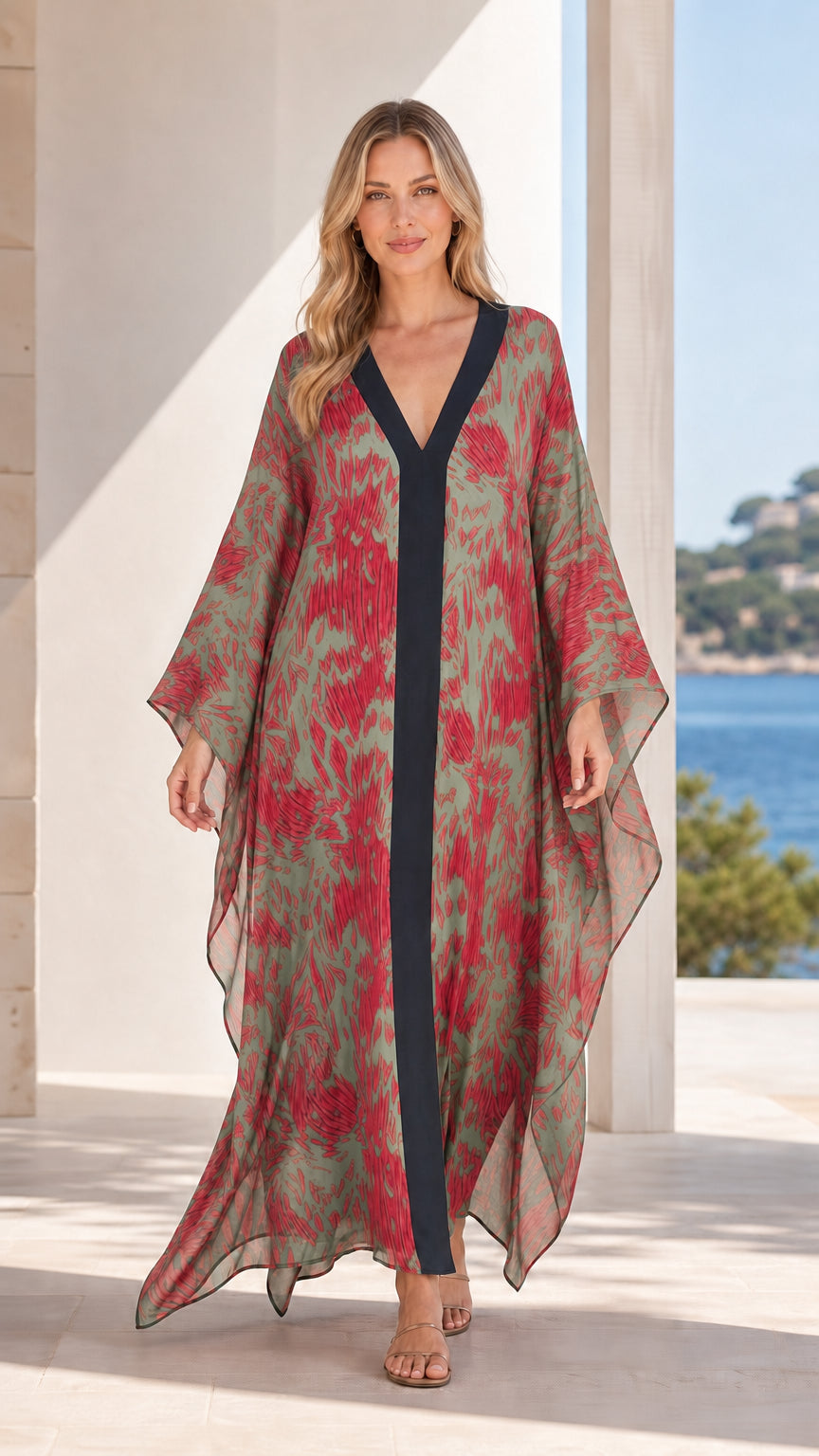 Front view of model wearing sage green printed maxi kaftan dress