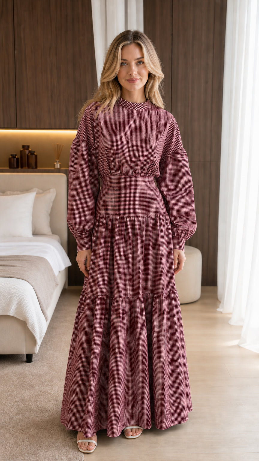 Front view of model wearing burgundy gingham maxi dress