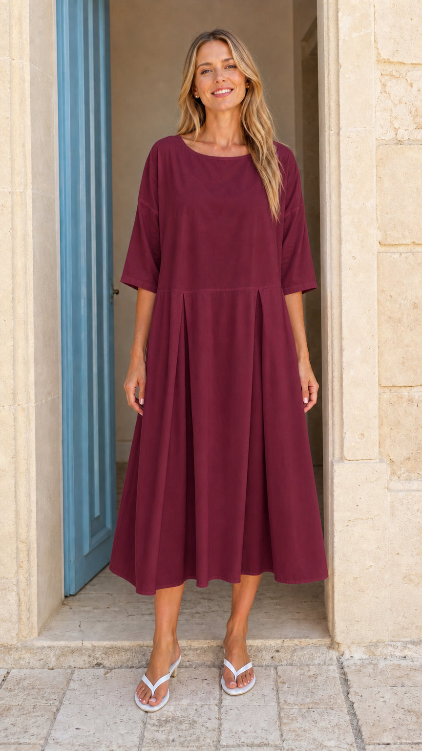 Model wearing burgundy casual pleated midi dress