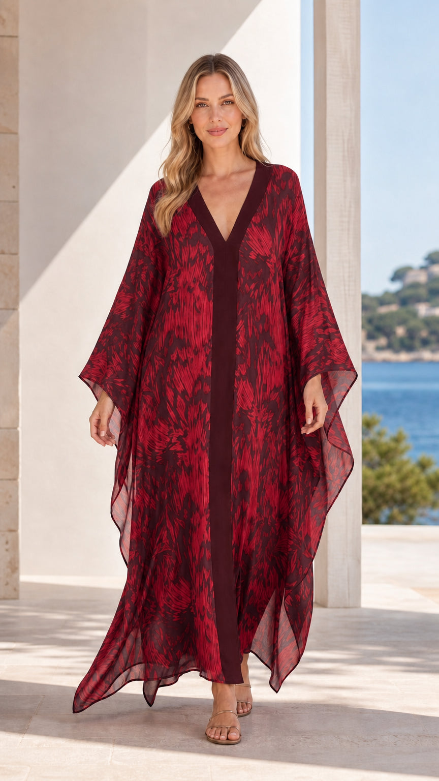 Front view of model wearing burgundy printed maxi kaftan dress