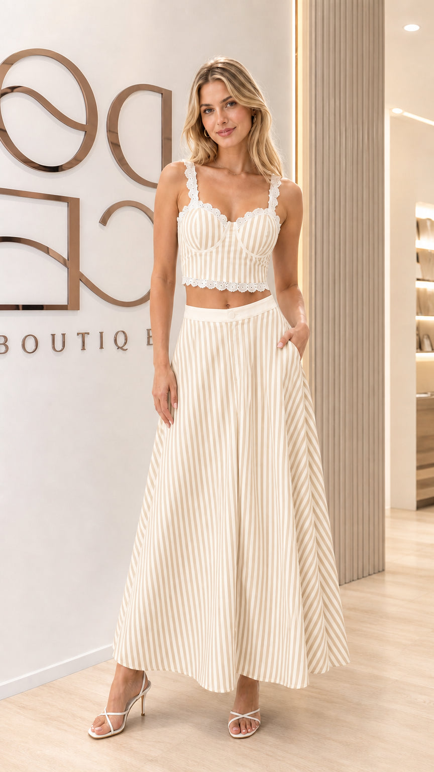Front view of the ivory striped two-piece maxi skirt outfit