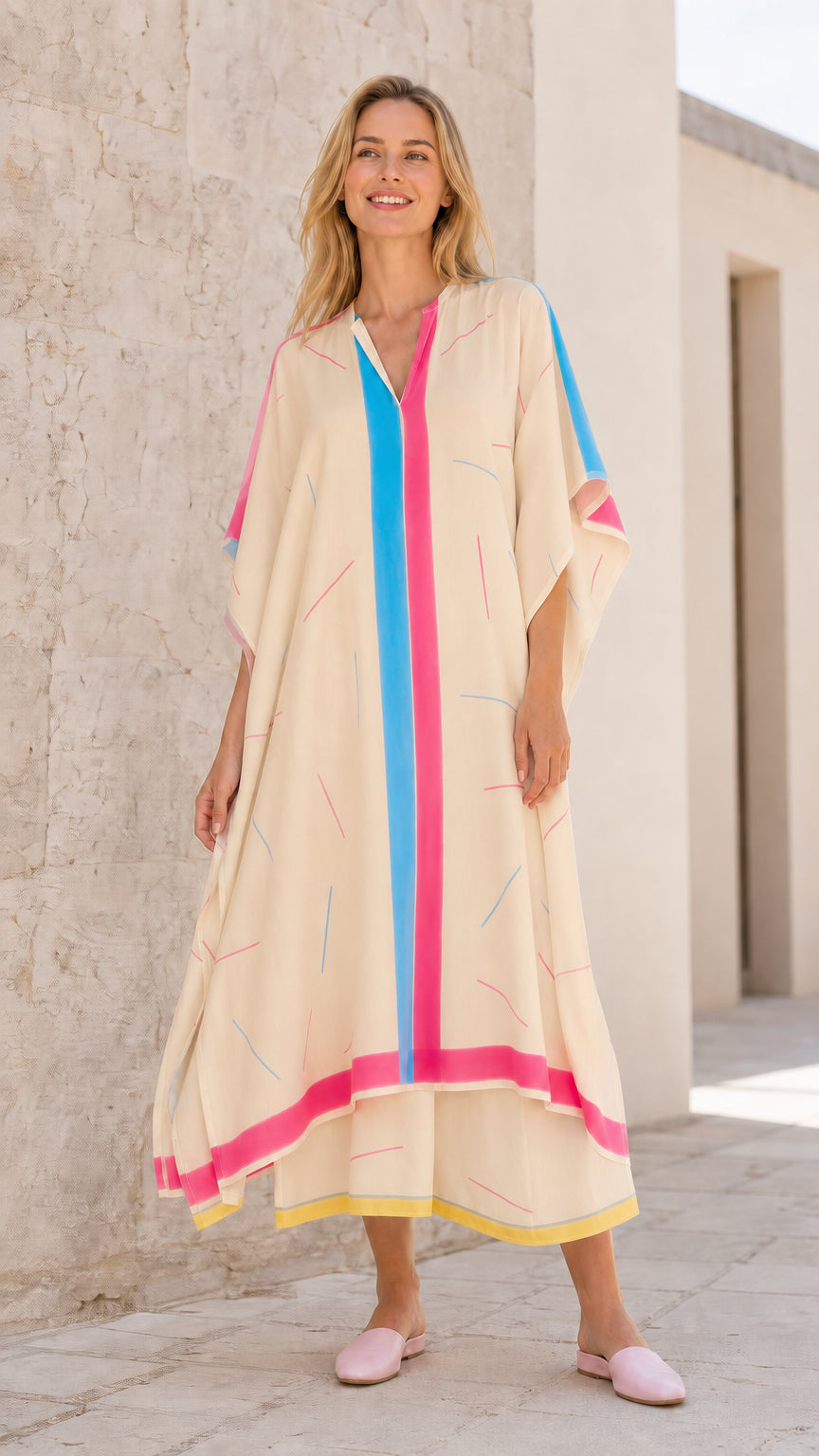 Front view of model wearing beige kaftan maxi dress