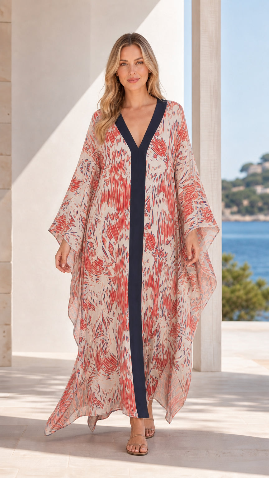 Front view of model wearing beige printed maxi kaftan dress